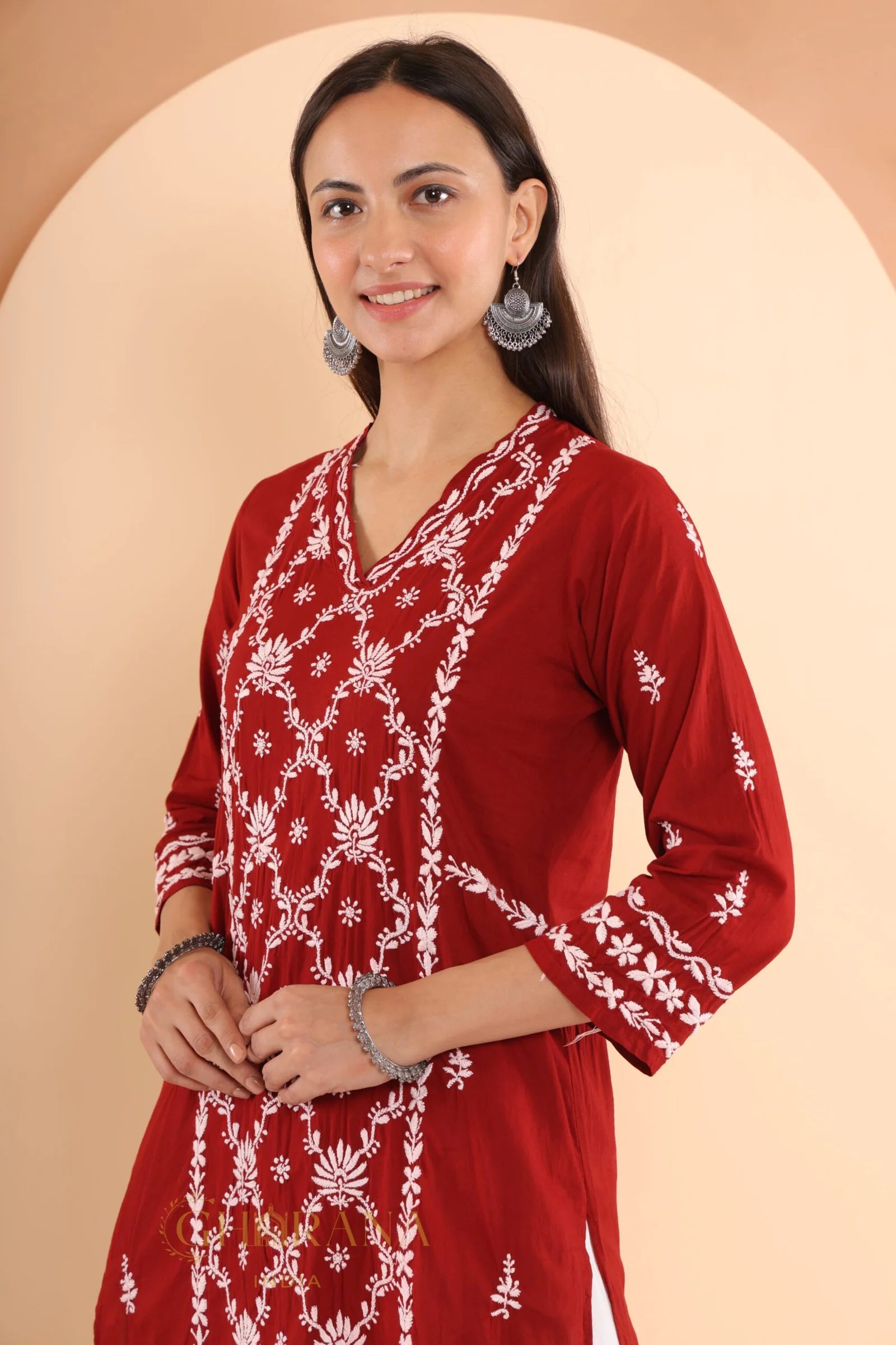 Sahiba Mul Cotton Maroon chikankari Kurta with intricate embroidery.