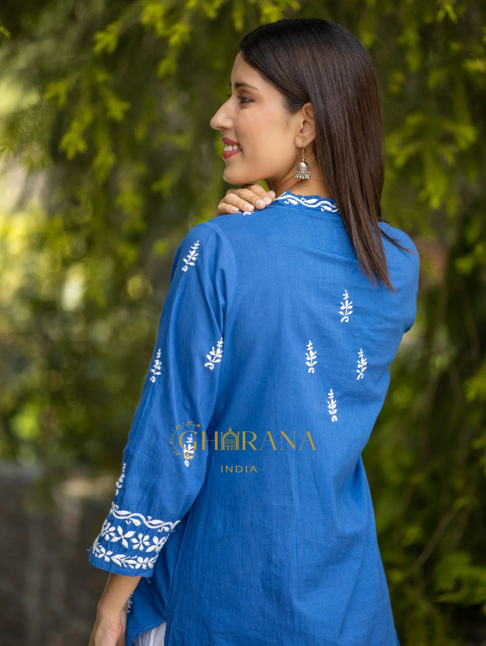 Sahiba Mul Cotton Blue Chikankari Kurta with intricate embroidery.