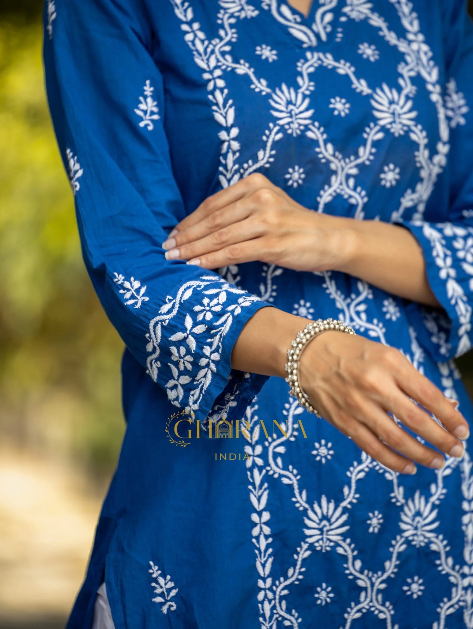 Sahiba Mul Cotton Blue Chikankari Kurta with intricate embroidery.
