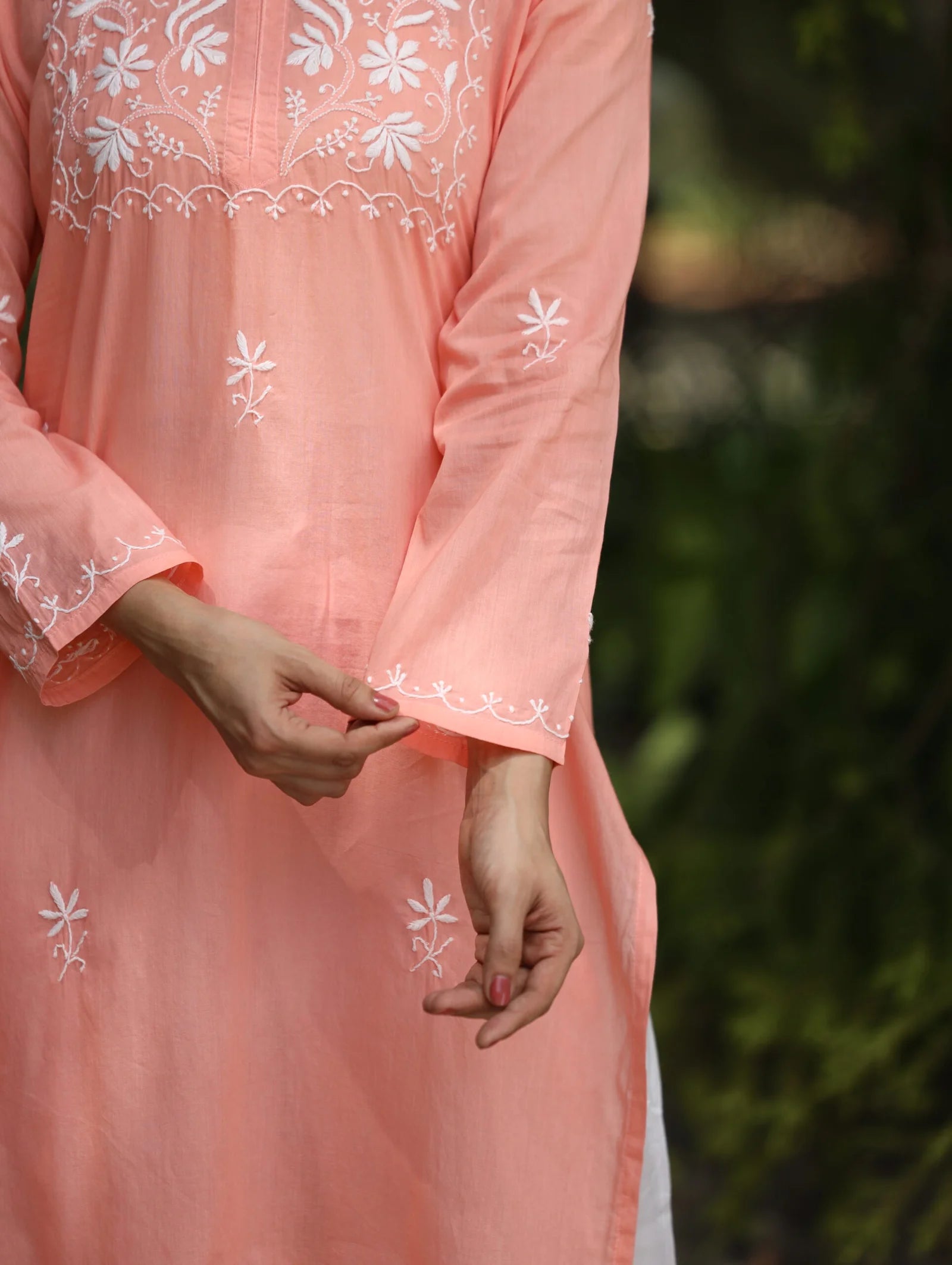 Sahiba Peach Pink Pure Cotton Chikankari Kurta with very intricate hand embroidery.